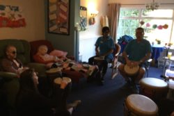 Residents-and-relatives-enjoying-a-few-beats-of-the-drum