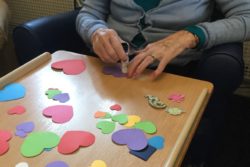 Residents-making-valentines-cards-and-coasters-