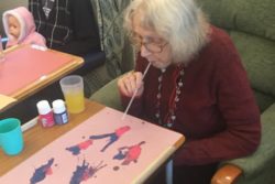 A-resident-trying-first-hand-at-some-paint-blowing-