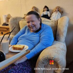 How comfortable and happy does Gill look with her delicious slice of cake