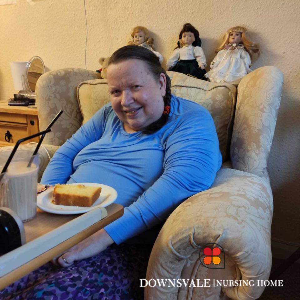 How comfortable and happy does Gill look with her delicious slice of cake