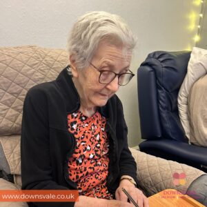 Writing Christmas Cards at Downsvale Nursing Home