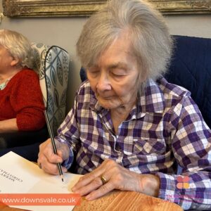Writing Christmas Cards at Downsvale Nursing Home