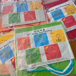 Colourful DIY woollen yarn painting kits ready for a fun and creative craft session.