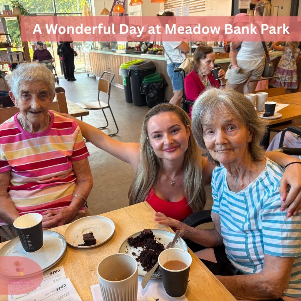 Care home residents enjoying cake and tea at a café.