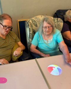 Residents take part in a fun digital ball game.